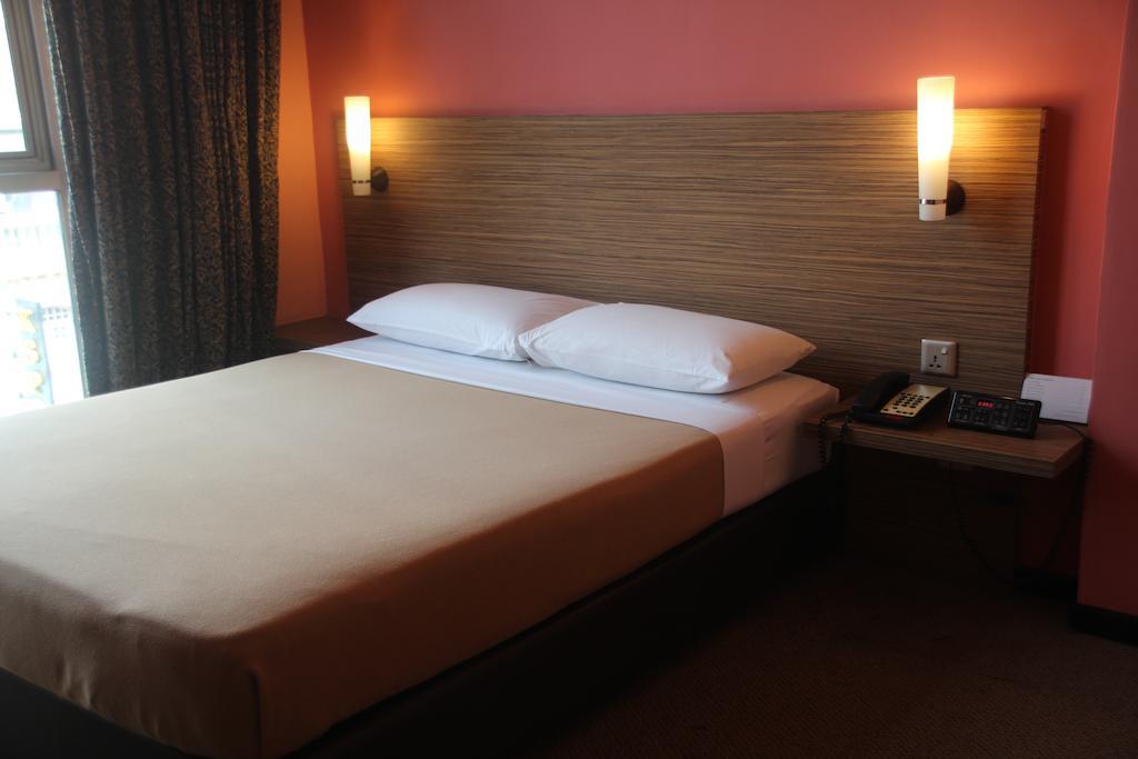 Classique Hotel Сингапур Номер фото