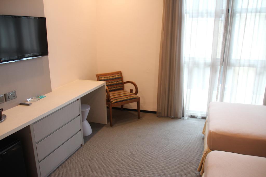Classique Hotel Сингапур Номер фото